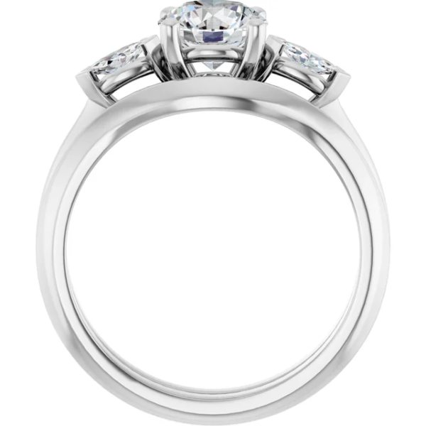 This 3 stone engagement ring set features a classic-meets-modern design, centered around a brilliant 6.5mm round-cut lab diamond. On either side, two accent stones enhance the sparkle, providing a balanced and meaningful composition. Even better, the curved wedding band aligns effortlessly with the engagement ring, creating a graceful and secure fit. As a result, this design not only captures elegance but also ensures comfort for daily wear. Additionally, the refined dimensions—approx. 7.5 x 2.9 mm top profile and 10.03g in total weight—make it feel substantial yet wearable.