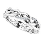 This twisted lab diamond eternity band features a graceful interwoven design, making it a unique and elegant choice for custom fine jewelry lovers. Perfect for stacking or wearing solo.