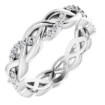 This twisted lab diamond eternity band features a graceful interwoven design, making it a unique and elegant choice for custom fine jewelry lovers. Perfect for stacking or wearing solo.