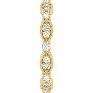 This marquise diamond eternity band showcases a thoughtful design, featuring alternating round lab-grown diamonds and marquise-shaped gold frames. The band curves naturally to fit the finger, creating a refined, timeless silhouette. Whether you prefer a minimal stack or a bold statement, this ring adapts effortlessly.