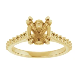 This 9x7 mm oval accented engagement ring mounting offers a perfect balance between center-stone focus and elegant side accents. Ideal for custom solitaire settings.