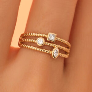 Elegant three band moissanite ring featuring princess, round, and marquise cuts. A perfect custom jewelry choice for unique engagement or fashion rings.