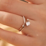 This Nature Inspired Lab Diamond Engagement Ring features a graceful branch design embracing a brilliant round cut lab-grown diamond, capturing the beauty of the natural world. We offer various metal options including 925 sterling silver, 9K/10K/14K/18K gold, and PT950 platinum. Gemstone customization is available, allowing you to choose from lab-grown diamonds, moissanite, cubic zirconia, natural diamonds, or colored gemstones. We also provide engraving services and support custom designs from images. Our professional design team will work closely with you to transform your vision into a one-of-a-kind custom engagement ring.