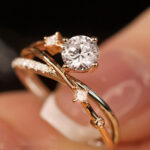 Discover the elegance of our Nature Inspired Lab Diamond Engagement Ring, featuring a round cut diamond embraced by delicate branch motifs. Perfect for brides seeking unique custom fine jewelry.