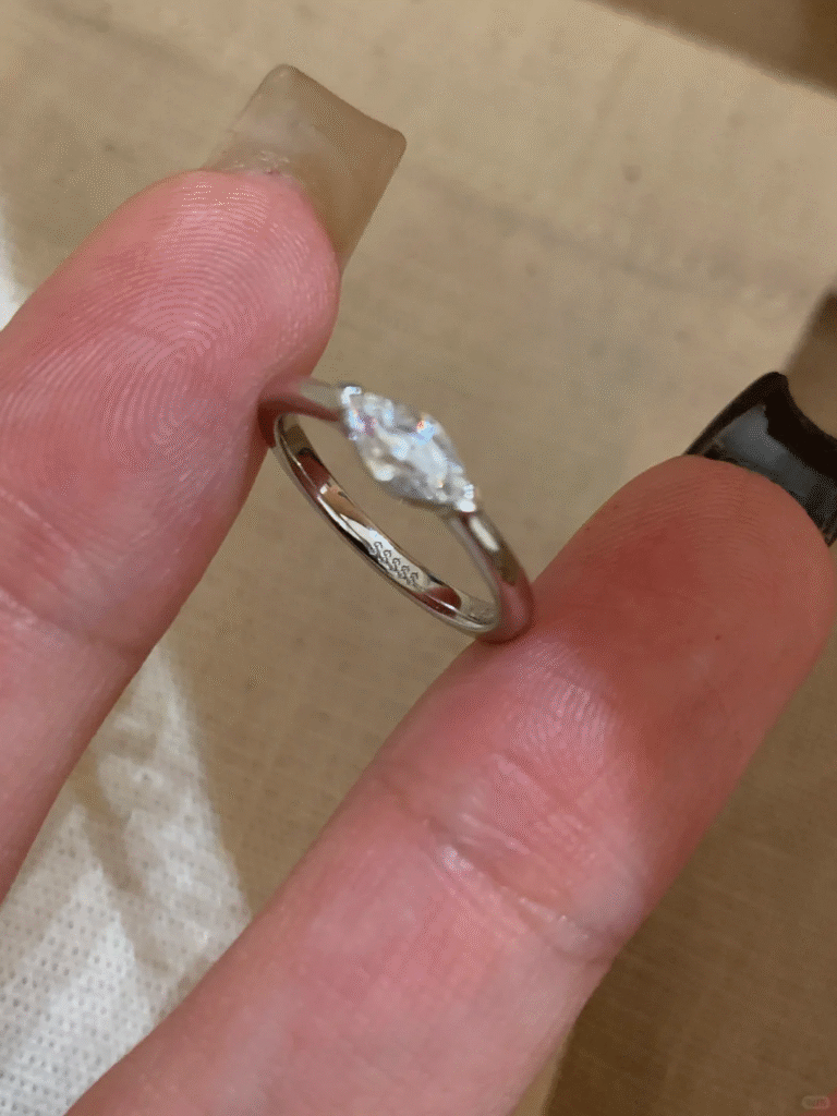 This marquise cut engagement ring features a stunning D color moissanite as its centerpiece, set on a sleek, minimalist band. In addition, you can personalize it in S925 silver, 9K, 14K, 18K gold, or Pt950 platinum, each available in white, yellow, or rose finishes.