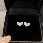 Shop custom heart moissanite earrings with 1pc MOQ. Perfect minimalist engagement fine jewelry with premium brilliance and fully personalized design options.