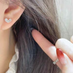 Shop custom heart moissanite earrings with 1pc MOQ. Perfect minimalist engagement fine jewelry with premium brilliance and fully personalized design options.