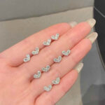 Shop custom heart moissanite earrings with 1pc MOQ. Perfect minimalist engagement fine jewelry with premium brilliance and fully personalized design options.