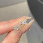 Shop custom heart moissanite earrings with 1pc MOQ. Perfect minimalist engagement fine jewelry with premium brilliance and fully personalized design options.