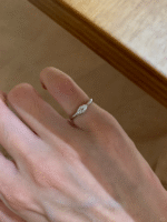 This marquise cut engagement ring features a stunning D color moissanite as its centerpiece, set on a sleek, minimalist band. In addition, you can personalize it in S925 silver, 9K, 14K, 18K gold, or Pt950 platinum, each available in white, yellow, or rose finishes.