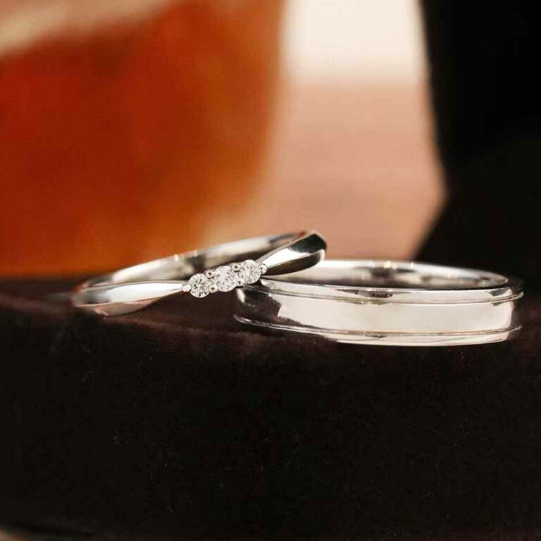 A custom couple ring set featuring a minimalist lab diamond band and a classic men’s wedding ring. Personalized wedding bands with 1pc MOQ for engagement or daily wear.