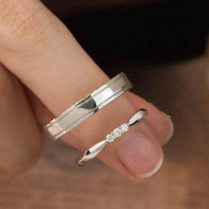 A custom couple ring set featuring a minimalist lab diamond band and a classic men’s wedding ring. Personalized wedding bands with 1pc MOQ for engagement or daily wear.