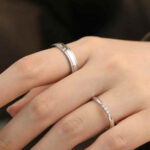 A custom couple ring set featuring a minimalist lab diamond band and a classic men’s wedding ring. Personalized wedding bands with 1pc MOQ for engagement or daily wear.