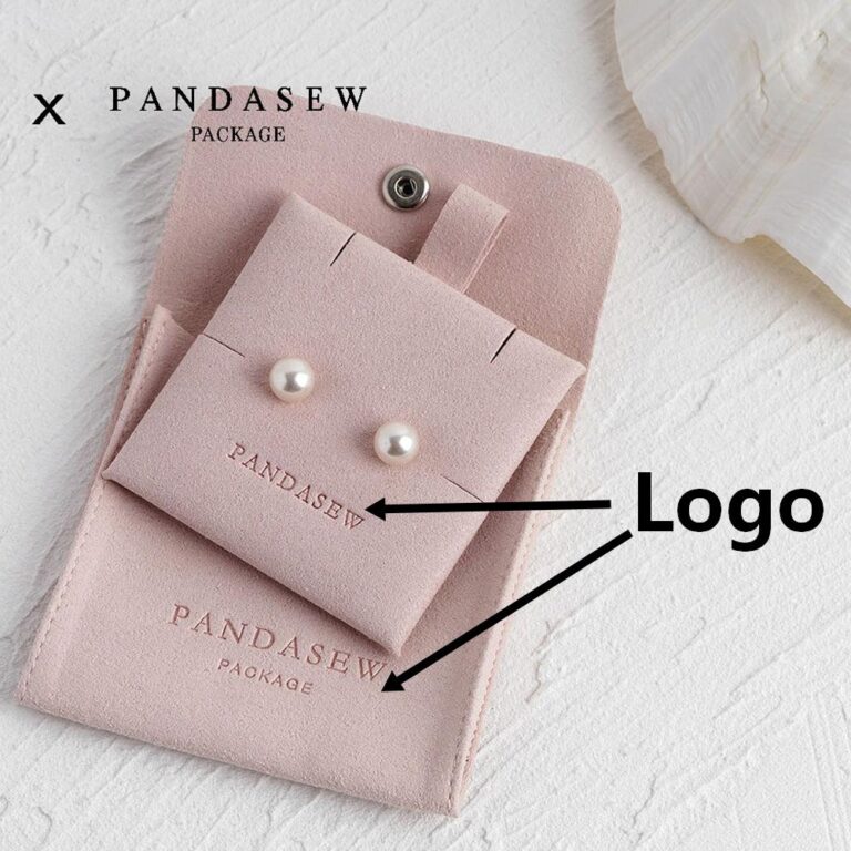 Custom microfiber suede jewelry packaging with logo customization. Available in pink, gray, and gray blue. Soft suede-like texture, durable, 100pcs MOQ.