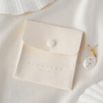 This custom logo jewelry pouch is created for jewelry brands, designers, and studios seeking dependable packaging solutions. It supports both small-batch and bulk orders, making it suitable for emerging brands as well as established businesses. Whether used as a primary packaging piece or as inner protection within a jewelry box, the pouch offers reliable storage and polished presentation. Its secure closure, refined texture, and customization flexibility make it a practical choice for long-term jewelry packaging strategies.