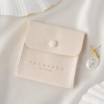 This custom logo jewelry pouch is created for jewelry brands, designers, and studios seeking dependable packaging solutions. It supports both small-batch and bulk orders, making it suitable for emerging brands as well as established businesses. Whether used as a primary packaging piece or as inner protection within a jewelry box, the pouch offers reliable storage and polished presentation. Its secure closure, refined texture, and customization flexibility make it a practical choice for long-term jewelry packaging strategies.