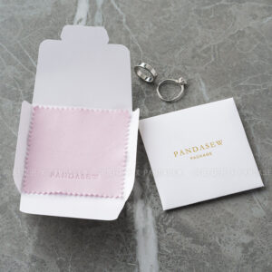 The pouch is designed to hold jewelry such as rings, necklaces, bracelets, and small accessories with ease. Its structure allows jewelry to remain protected from dust and surface contact while maintaining a neat appearance inside boxes or outer packaging. This custom logo jewelry pouch integrates smoothly into existing packing systems and works well as an inner layer for jewelry boxes, shipping packages, or retail presentation.