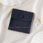 This custom logo jewelry pouch is created for jewelry brands, designers, and studios seeking dependable packaging solutions. It supports both small-batch and bulk orders, making it suitable for emerging brands as well as established businesses. Whether used as a primary packaging piece or as inner protection within a jewelry box, the pouch offers reliable storage and polished presentation. Its secure closure, refined texture, and customization flexibility make it a practical choice for long-term jewelry packaging strategies.