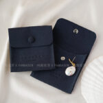 This custom logo jewelry pouch is created for jewelry brands, designers, and studios seeking dependable packaging solutions. It supports both small-batch and bulk orders, making it suitable for emerging brands as well as established businesses. Whether used as a primary packaging piece or as inner protection within a jewelry box, the pouch offers reliable storage and polished presentation. Its secure closure, refined texture, and customization flexibility make it a practical choice for long-term jewelry packaging strategies.