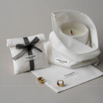 This custom logo jewelry pouch is a practical packaging solution designed for jewelry brands that value simplicity, consistency, and everyday usability. Made from soft cotton fabric, it provides a clean and reliable way to store and protect jewelry pieces such as rings, earrings, bracelets, and necklaces. Rather than acting as decorative packaging, this pouch focuses on function, brand clarity, and efficient order fulfillment across retail and online channels.