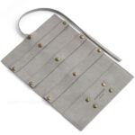 Custom microfiber jewelry roll made from soft suede. It is designed for jewelry brands seeking compact, multi-functional, and professional travel packaging solutions.