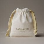 custom logo jewelry pouch, burlap jewelry pouch, natural jewelry bag, jewelry packaging pouch, eco jewelry packaging, branded jewelry pouch, OEM jewelry pouch, jewelry storage bag, wholesale jewelry packaging, minimalist jewelry pouch