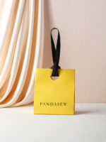 This custom colorful jewelry bag features a portable handle and a vibrant finish. It provides a secure and elegant storage solution for jewelry.