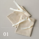 This custom ribbon jewelry pouch features a soft bow and a silk-like feel. It provides a sweet and secure solution for jewelry branding.