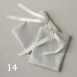 This custom ribbon jewelry pouch features a soft bow and a silk-like feel. It provides a sweet and secure solution for jewelry branding.