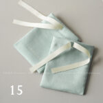 This custom ribbon jewelry pouch features a soft bow and a silk-like feel. It provides a sweet and secure solution for jewelry branding.