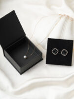 Custom book style jewelry box featuring a sophisticated magnetic closure. It is ideal for jewelry brands seeking high-end, durable, and professional packaging solutions.