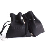 This custom microfiber ingot pouch features a unique ingot shape. It provides a soft, elegant, and secure storage solution for professional jewelry branding with a 100pc MOQ.