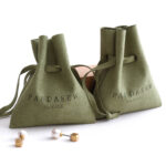 This custom microfiber ingot pouch features a unique ingot shape. It provides a soft, elegant, and secure storage solution for professional jewelry branding with a 100pc MOQ.