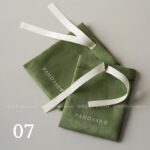 This custom ribbon jewelry pouch features a soft bow and a silk-like feel. It provides a sweet and secure solution for jewelry branding.