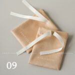 This custom ribbon jewelry pouch features a soft bow and a silk-like feel. It provides a sweet and secure solution for jewelry branding.