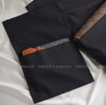 This custom cotton envelope pouch features a sleek design and soft fabric. It provides a natural and secure solution for jewelry branding.