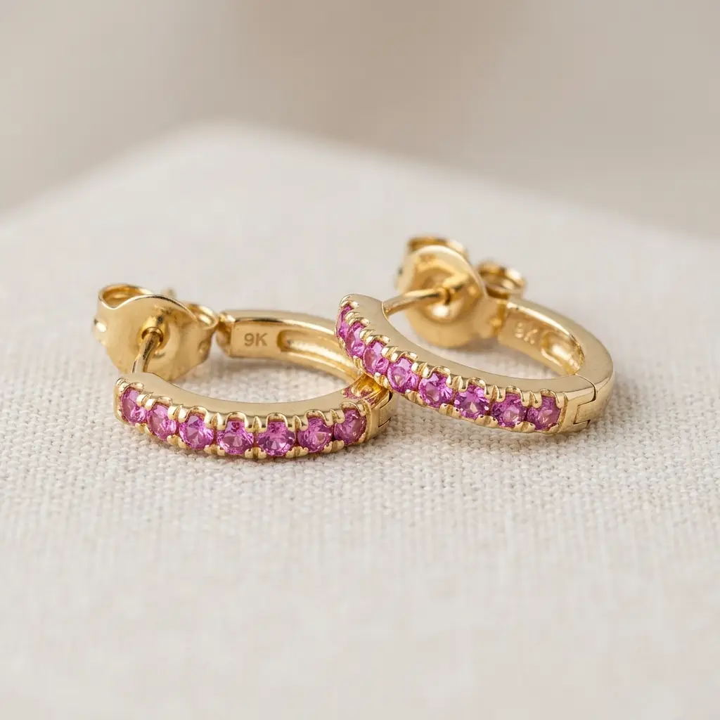 private label 9K yellow gold pink sapphire huggie earrings supplier — custom jewelry manufacturing photo 1