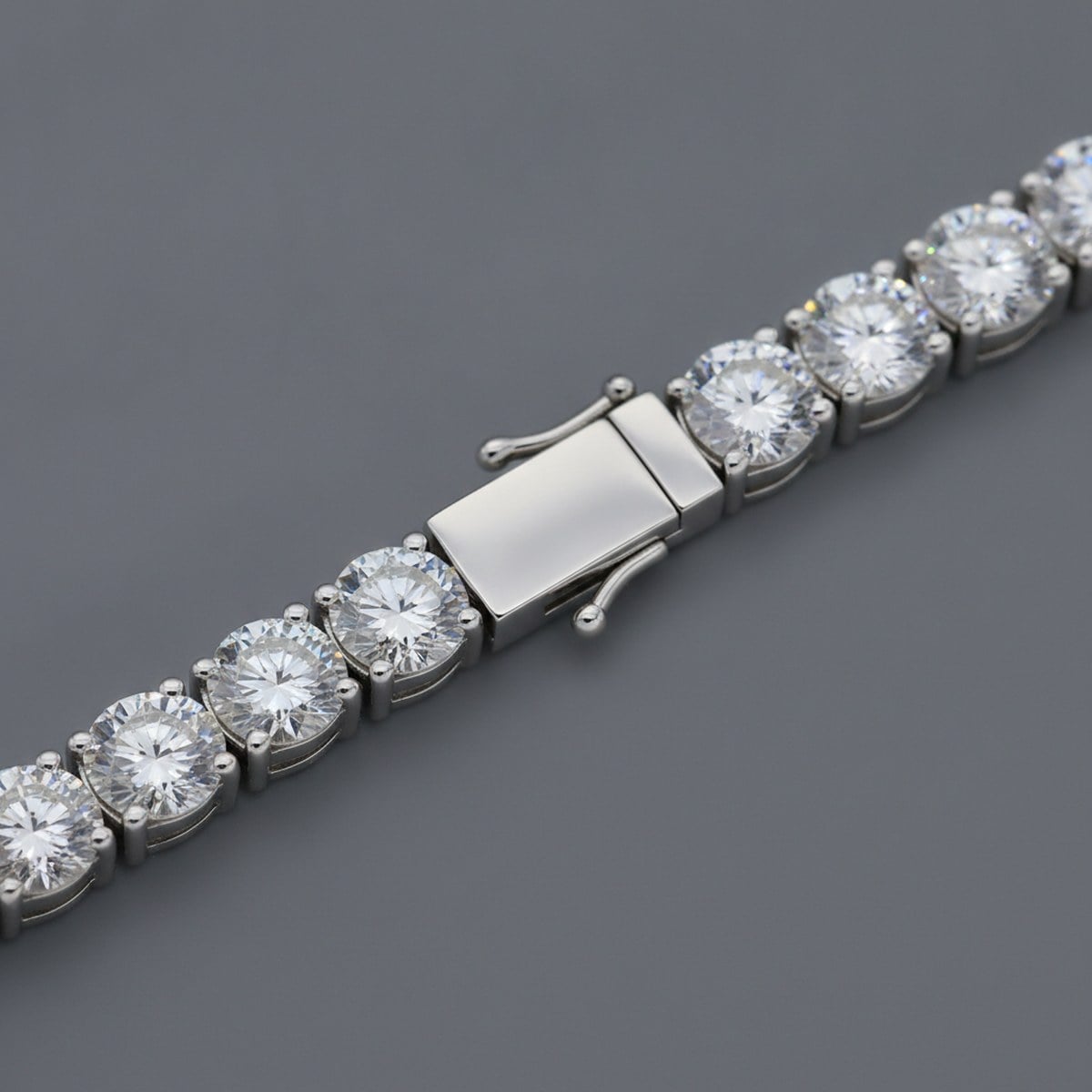 White-gold tennis bracelet box clasp and stone links — Alpha Jewelry